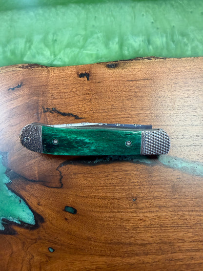 Trapper Hidden Release Green Giraffe Bone Handles